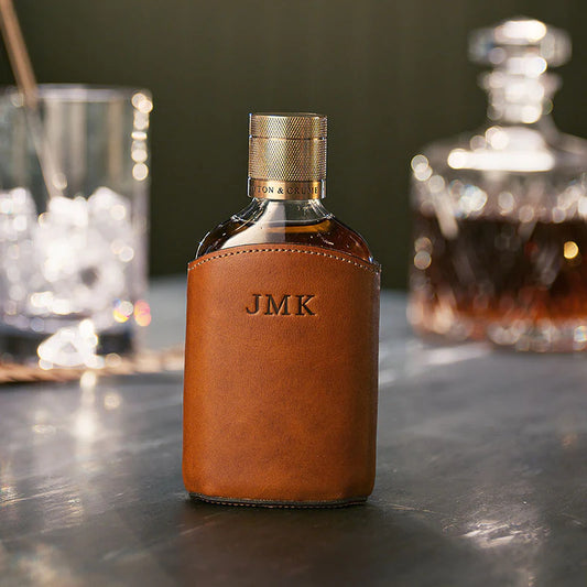 LEATHER WRAPPED GLASS FLASK